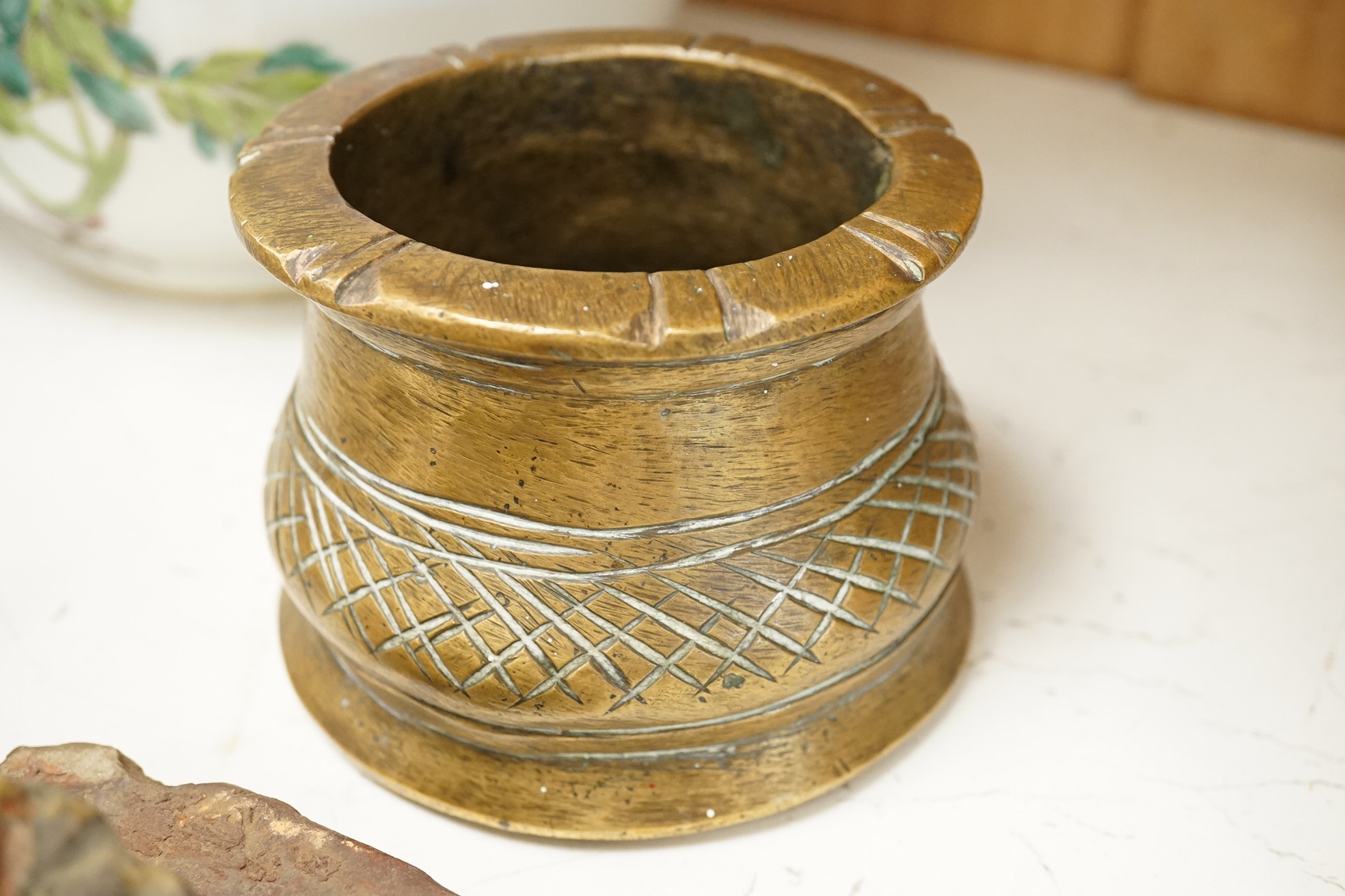 A South-East Asian bronze censer, two Ushabti and an Egyptian painted terracotta mask, 24cm